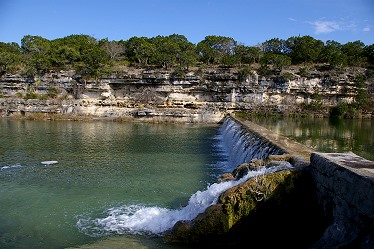 Overflowing dam at Mo Ranch, Texas